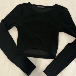 Cropped black long sleeve top